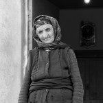 A woman who was displaced from Nagorno-Karabakh outside her current home in Sumqayit, Azerbaijan, on Friday, Nov. 4, 2005.