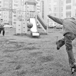 Children play soccer near a center for drug dealing in Kazan, Russia, on Saturday, September 22, 2007.